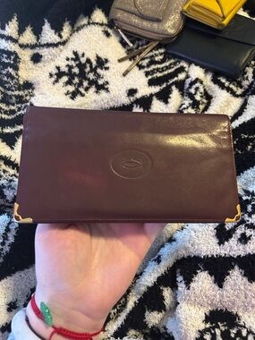 CARTIER Vintage Embossed Leather Long Wallet in Deep Burgundy with Gold Corners